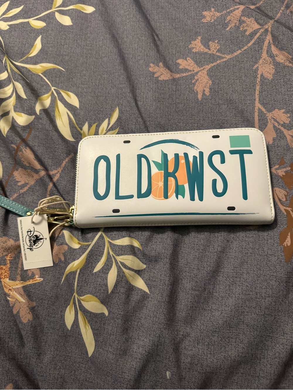 Loungefly White Wristlet Wallet with Teal and Orange License Plate Design